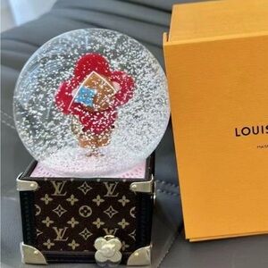 Louis Vuitton Festive Snow Globe with Red and Brown Design